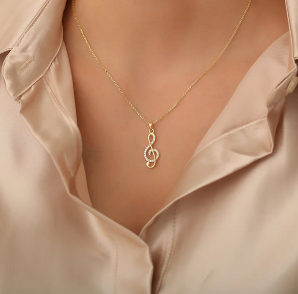 The perfect touch: the elegance of the treble clef necklace